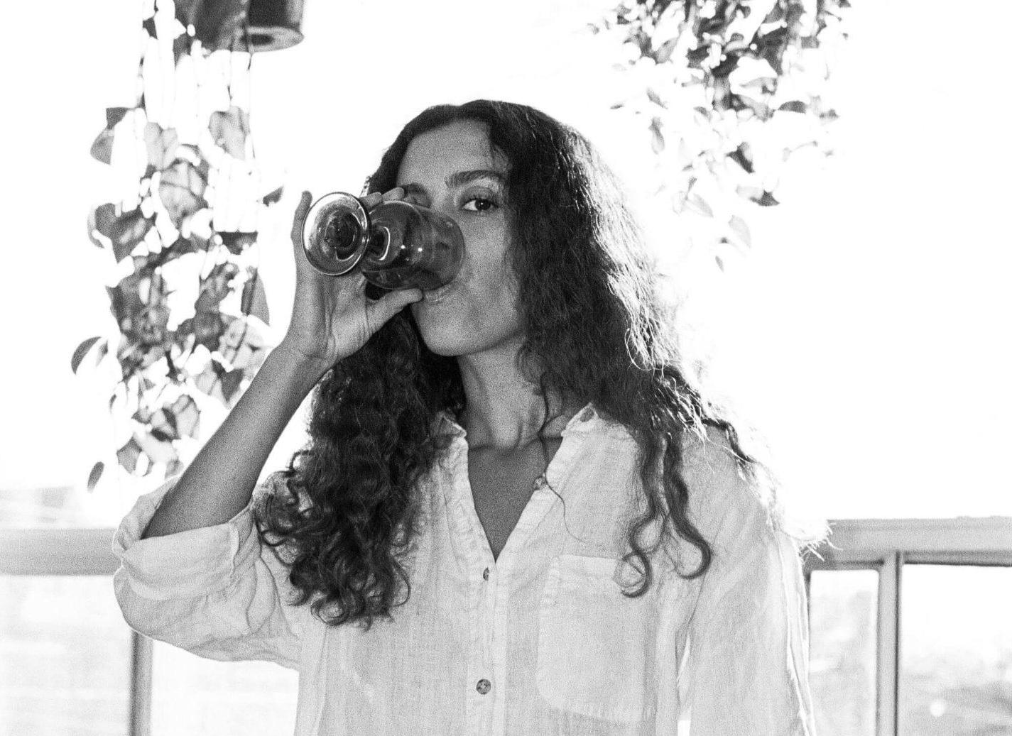 Image of Tonya drinking from a glass